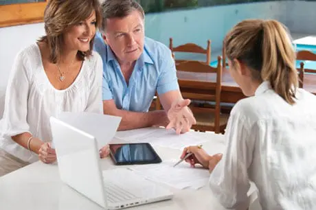 Older couple having a meeting with an Advisor.