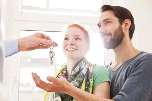 Couple receiving a set of keys